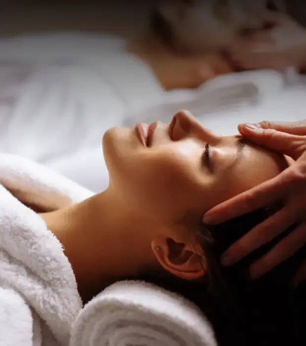 Woman enjoying head massage 