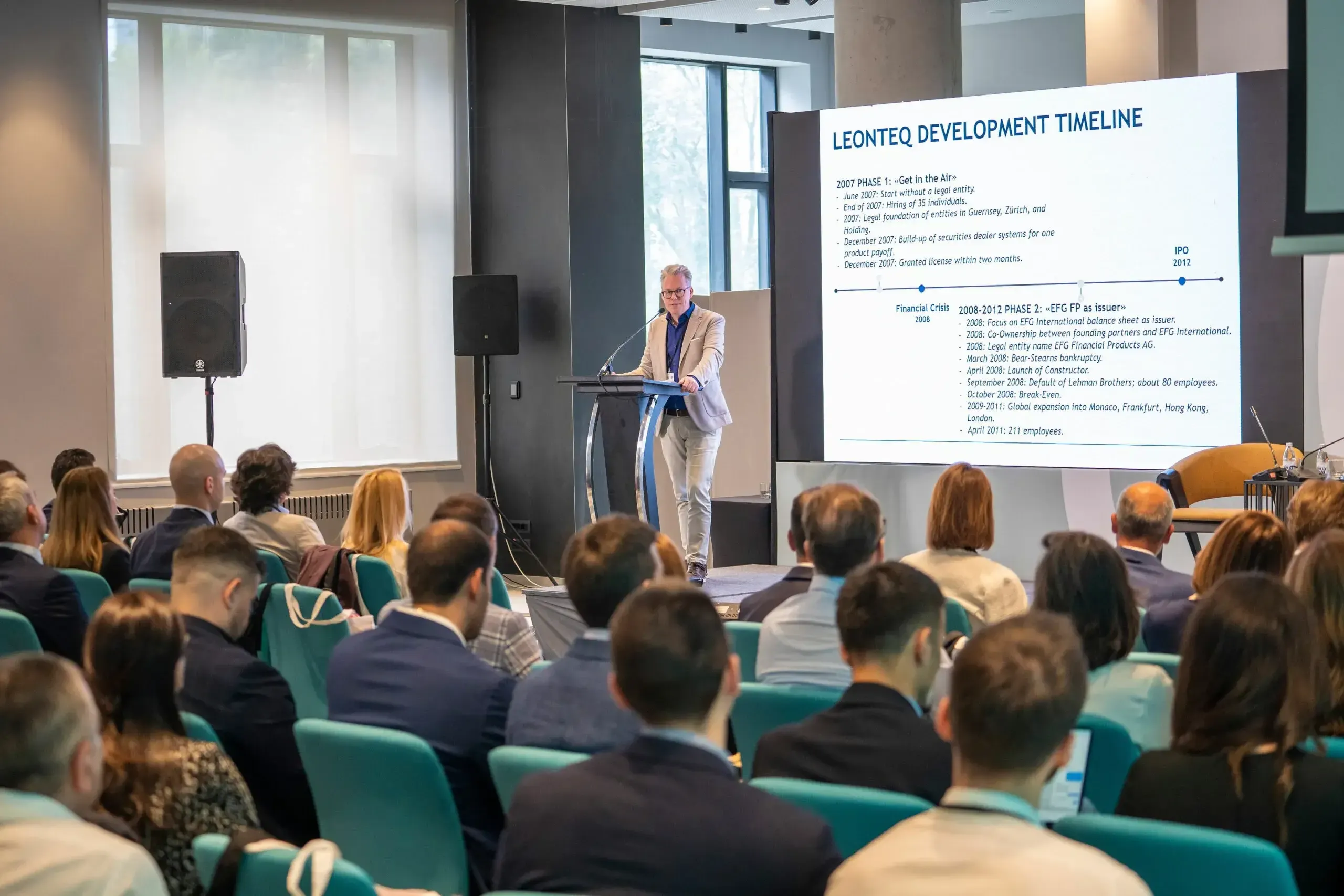 A man giving a presentation to a group of people