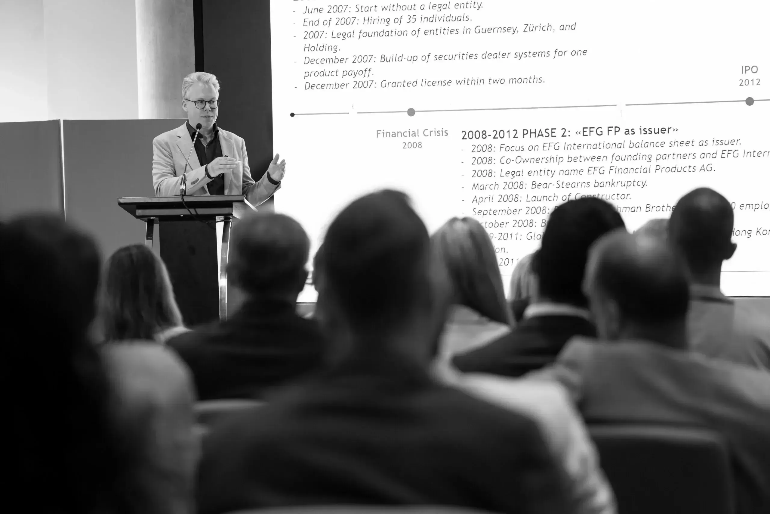 A man giving a presentation to a group of people