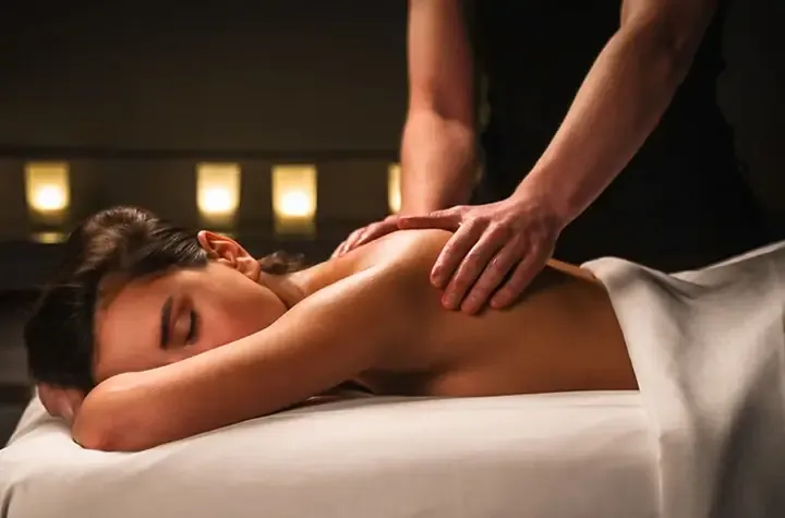 A woman getting a back massage